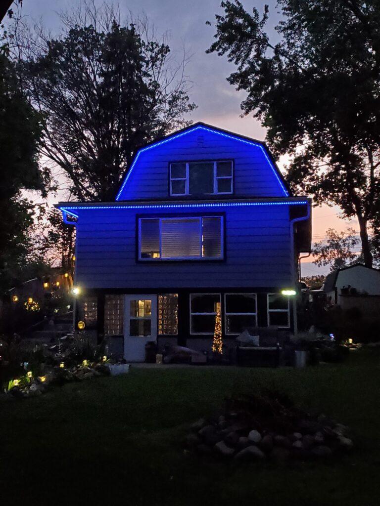 Permanent holiday lighting installed on a home.